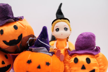 Halloween decoration with pumpkin and witch on white background, close upの写真素材