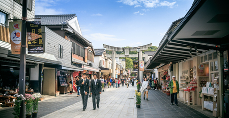 FUKUOKA, KYUSHU, JAPAN- November 12, 2015: Fukuoka on November 12, 2015. Tourists are traveling in the shopping street of Dazaifu shrine.のeditorial素材