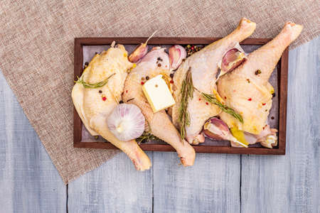 Raw chicken legs. Fresh BIO ingredient for preparation traditional food. Spice, vegetable, herbs,...