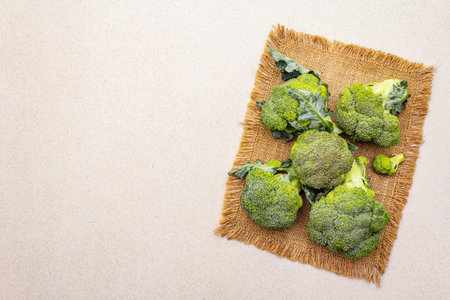 Fresh raw Broccoli. Source of vitamins and minerals. Ingredient for preparing healthy vegan...