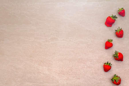 Organic fresh strawberry, isolated on a white background. Cooking fruit stone background, copy...