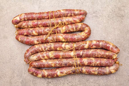 Raw pork sausage. Ingredient for cooking on the grill, picnic and homemade or restaurant food. On a...
