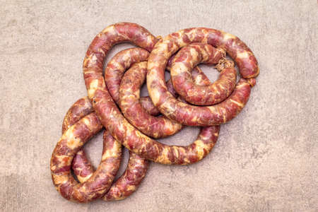 Raw pork sausage. Ingredient for cooking on the grill, picnic and homemade or restaurant food. On a...