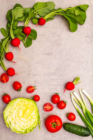 Assortment fresh organic vegetables. Food cooking stone background. Healthy vegetarian (vegan) eating concept, copy space, top view, flat layの写真素材