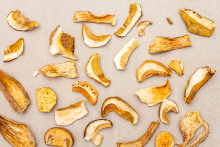 Dried mushrooms boletus edulis (penny bun, cep, porcino). Ingredient for vegetarian (vegan) food. On...
