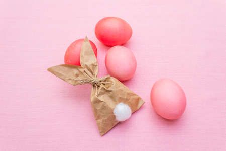Easter bunny (rabbit) paper gift egg wrapping idea. Handicraft (homemade) concept for children...