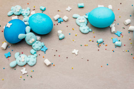 Easter kids hot sweet chocolate or cocoa with funny marshmallow bunny rabbits and easter eggs. On...