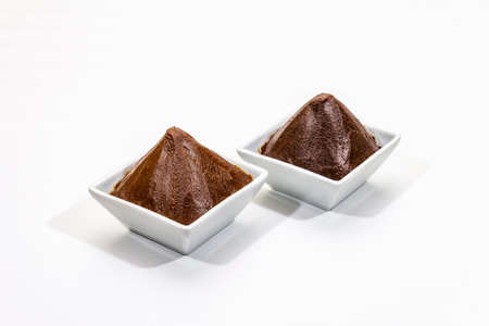 Miso, traditional Japanese seasoning. Two types, dark and light brown paste, isolated on white background. Copy space, mockupの写真素材