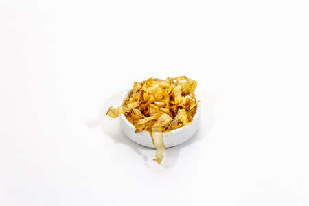 Tuna shaving katsuobushi, bonito flakes, ingredient of japanese soup dashi. Isolated on white background, copy spaceの写真素材