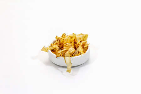 Tuna shaving katsuobushi, bonito flakes, ingredient of japanese soup dashi. Isolated on white background, copy spaceの写真素材
