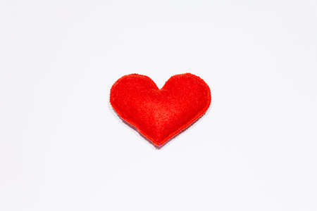 Red felt heart isolated on white background. Valentines Day or Wedding romantic conceptの写真素材