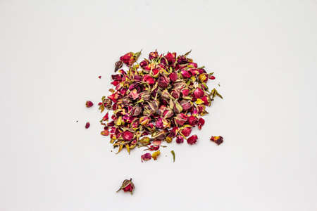 Traditional Turkish rose bud tea isolated on white background. Dry flowers, petals. Healthy lifestyle conceptの写真素材