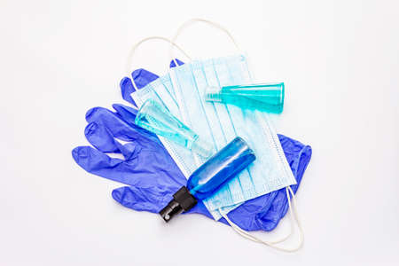 Mask, gloves, sanitizer isolated on white background. Medical products for personal hygiene and the prevention of viral diseases. Coronavirus, COVID-19 pandemic, 2019-nCoV worldwide conceptの写真素材