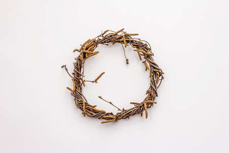 Wicker wreath of birch branches isolated on white background. Easter zero waste, DIY concept. Design...