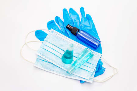 Mask, gloves, sanitizer isolated on white background. Medical products for personal hygiene and the prevention of viral diseases. Coronavirus, COVID-19 pandemic, 2019-nCoV worldwide conceptの写真素材