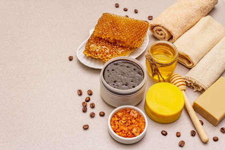 Spa concept. Self care with honey, coffee and turmeric. Natural organic cosmetics, homemade product, alternative lifestyle. White putty backgroundの写真素材
