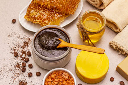 Spa concept. Self care with honey, coffee and turmeric. Natural organic cosmetics, homemade product, alternative lifestyle. White putty backgroundの写真素材