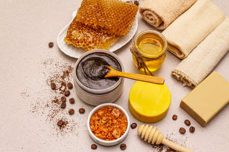 Spa concept. Self care with honey, coffee and turmeric. Natural organic cosmetics, homemade product, alternative lifestyle. White putty backgroundの写真素材