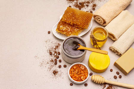 Spa concept. Self care with honey, coffee and turmeric. Natural organic cosmetics, homemade product, alternative lifestyle. White putty backgroundの写真素材
