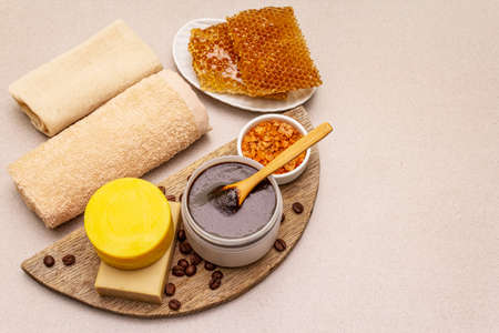 Spa concept. Self care with honey, coffee and turmeric. Natural organic cosmetics, homemade product, alternative lifestyle. White putty backgroundの写真素材