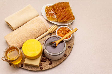 Spa concept. Self care with honey, coffee and turmeric. Natural organic cosmetics, homemade product, alternative lifestyle. White putty backgroundの写真素材