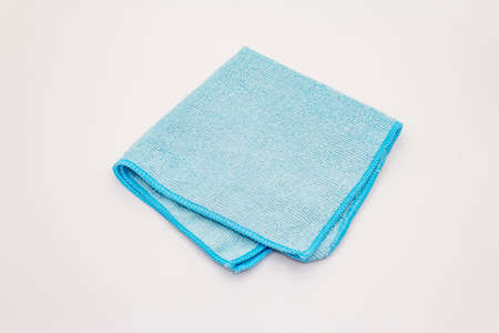 Blue duster isolated on white background. House cleaning product, home disinfection in quarantineの写真素材