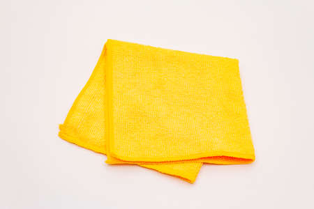 Orange duster isolated on white background. House cleaning product, home disinfection in quarantineの写真素材