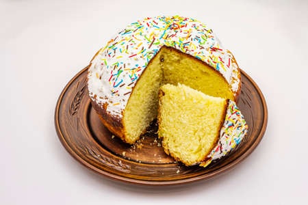 Easter cake isolated on white background. Traditional Orthodox festive bread, cut piecesの写真素材