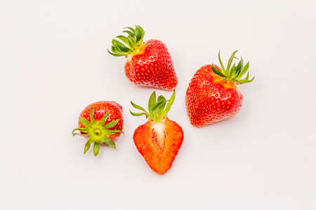 Sweet fresh strawberry isolated on white background. Ripe berries fruit tasty ingredient for many dishesの写真素材