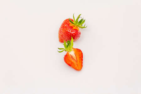 Sweet fresh strawberry isolated on white background. Ripe berries fruit tasty ingredient for many dishesの写真素材