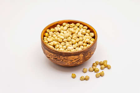 Dry chickpea isolated on white background. Traditional ingredient for cooking hummus. Middle Eastern and Mediterranean cuisineの写真素材