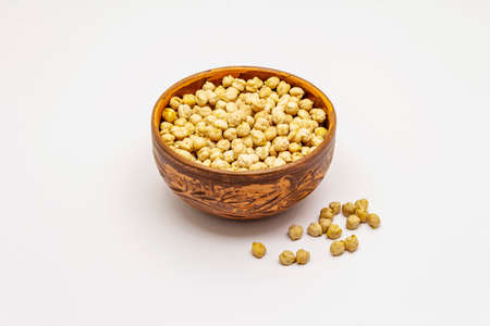 Dry chickpea isolated on white background. Traditional ingredient for cooking hummus. Middle Eastern and Mediterranean cuisineの写真素材