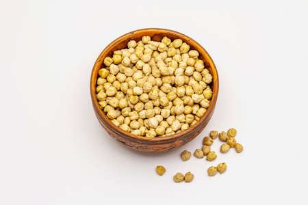 Dry chickpea isolated on white background. Traditional ingredient for cooking hummus. Middle Eastern and Mediterranean cuisineの写真素材