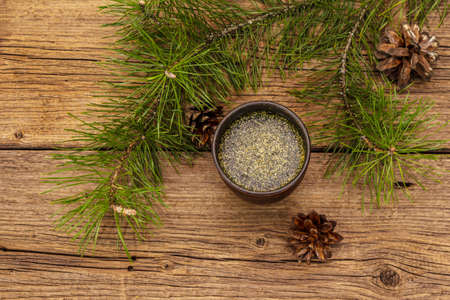 Pine needle tea, sollip-cha, traditional Korean beverage. Alternative medicine, healthy life style. Vintage wooden boards backgroundの写真素材