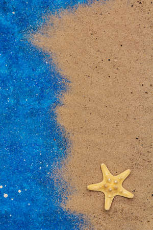 Navy blue nautical summer background wish sand and sea star, top viewの写真素材