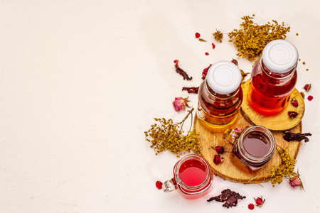 Kombucha. Set of different flavors with dry herbs and flowers. Healthy fermented food, Probiotic...