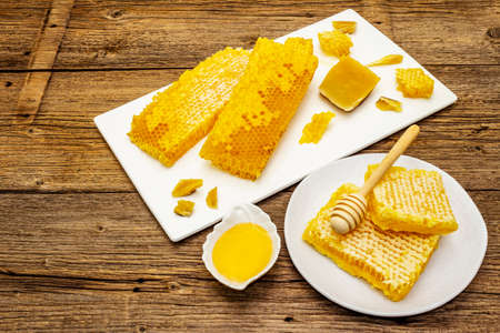 Honeycomb, honey and beeswax. Natural organic beekeeping products for a healthy and beauty...
