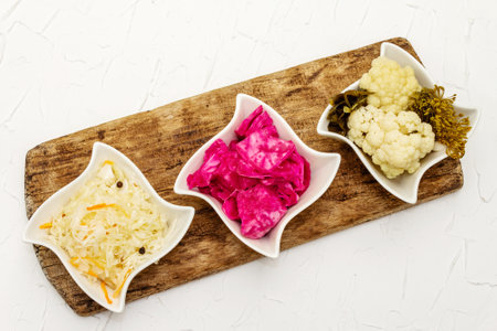 Assorted different types of sauerkraut. Fermented foods are great for your health. Probiotics nutrition concept, top viewの写真素材