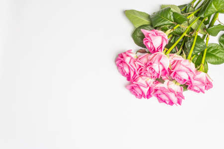 A bouquet of gentle pink roses isolated on white background. The festive concept for Weddings, Birthdays, March 8th, Mother's, or Valentine's Day. Greeting card, flat lay, mockup, templateの写真素材