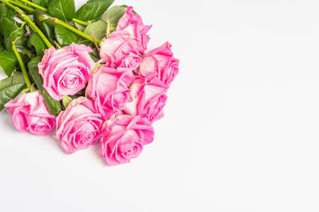 A bouquet of gentle pink roses isolated on white background. The festive concept for Weddings, Birthdays, March 8th, Mother's, or Valentine's Day. Greeting card, flat lay, mockup, templateの写真素材