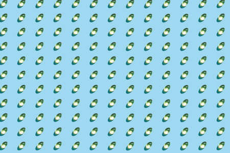 Omega-3 tablets pattern on a blue matte background. Healthy life concept, prevention of various diseases. Trendy hard light, dark shadow, flat lay, mockup, template, top viewの写真素材