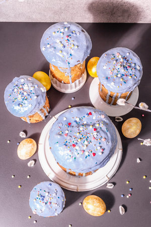Easter cake with blue icing, topping, edible beads. Natural healthy ingredients, golden eggs,...