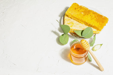 Honeycomb, honey, and beeswax. Natural organic beekeeping products for a healthy and beautiful...