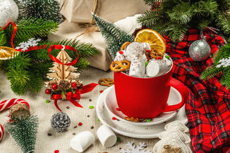 Hot cocoa or chocolate with marshmallows. Christmas traditional decor, New Year festive arrangement. The concept of coziness and good mood, copy spaceの写真素材