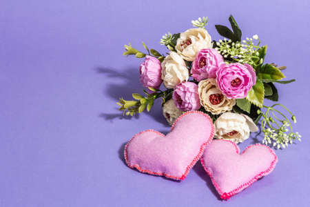 spring gift set. Present box, flowers bouquet, festive decor. Valentines or Mother's Day, Wedding concept. A trendy hard light, dark shadow, trendy very pericolor background, copy spaceの写真素材