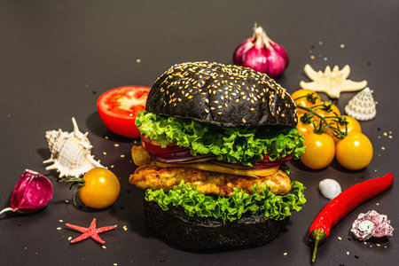 Culinary background with ripe vegetables. Yellow tomato cherries, chili pepper, garlic, purple basil. Fresh vegetables on white putty background, modern hard light, dark shadow, flat lay, top viewの写真素材