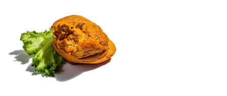 Traditional Oktoberfest smoked pork knuckle eisbein isolated on white. German festival food concept....