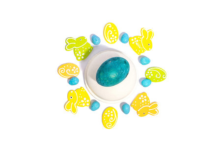 Easter egg on a beton stand isolated on white background. Traditional festive symbol, sweet decor,...