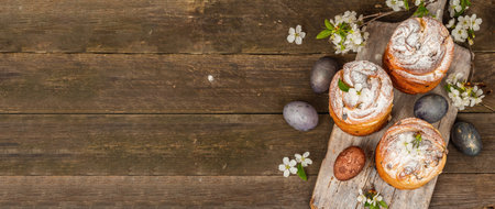 Easter cake Cruffin or sweet bread kulich with painted eggs. Traditional festive baking and fresh...