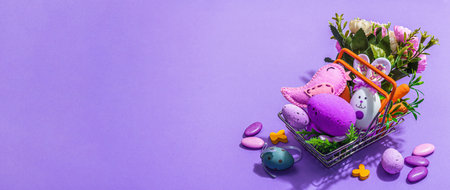 Easter sale concept. Shopping basket with festive symbols - rabbit, eggs, bird, and traditional decor. Cute design, hard light, dark shadow, trendy very peri color background, banner formatの写真素材